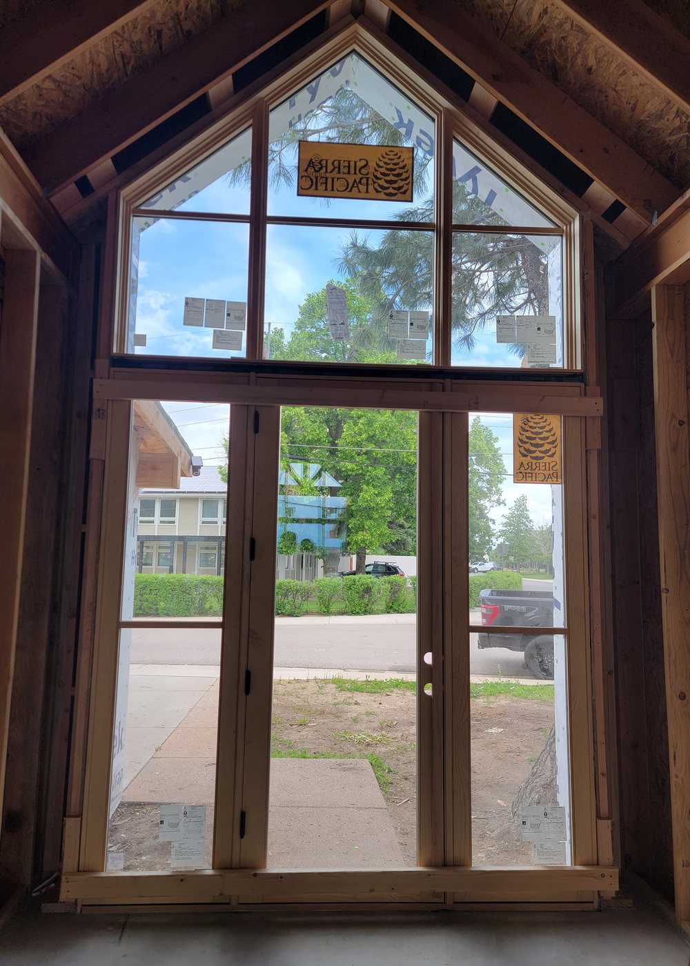Timber truss over the entry at 1450 High St