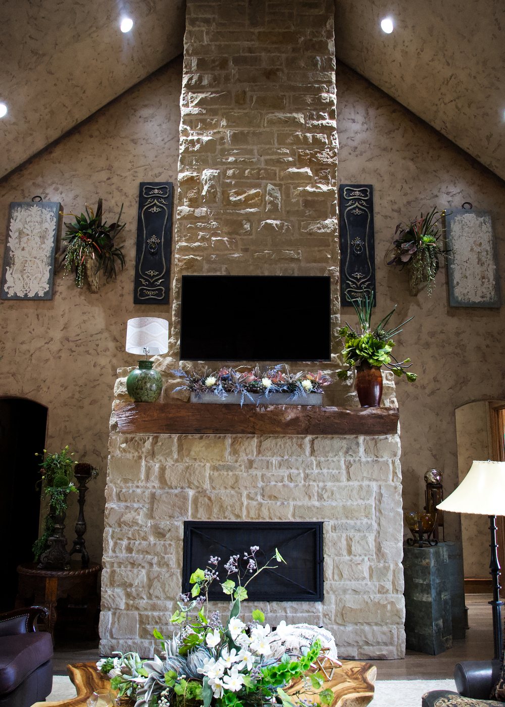 Floor-to-ceiling stone fireplace in the Saulsbury House great room
