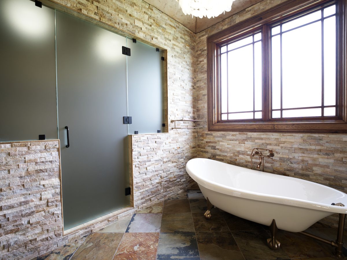 Primary bath with freestanding tub and glass shower